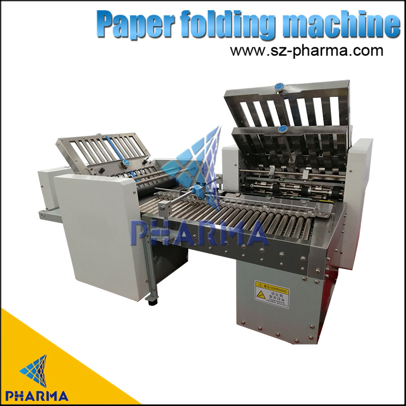 Manual paper folding machines for pharmaceutical use